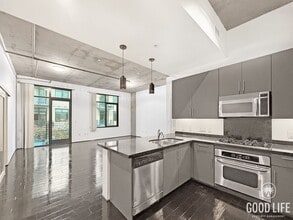 Building Photo - Modern 1BR/2BA Condo with 2 Parking Spaces...
