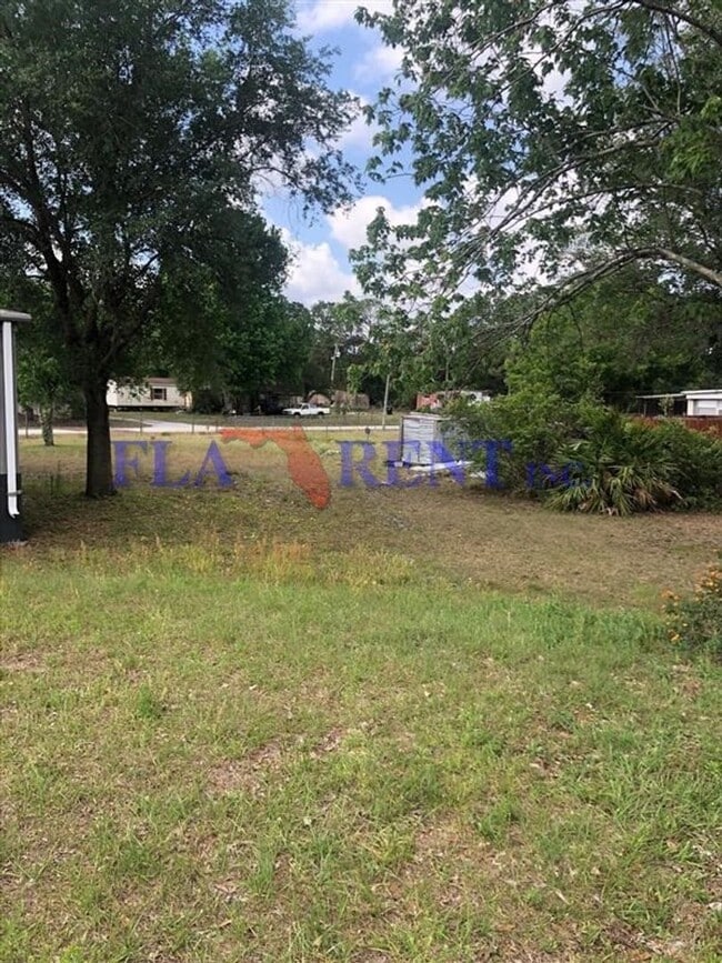 Building Photo - Newly renovated 4/2 Mobile home on large l...
