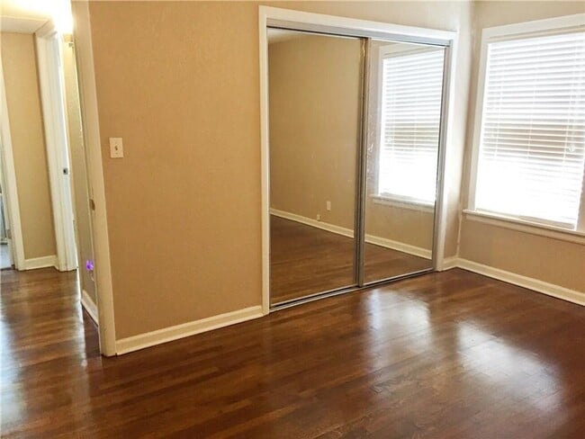 Building Photo - Remodeled 1 story home in Hurst with original plank wood flooring