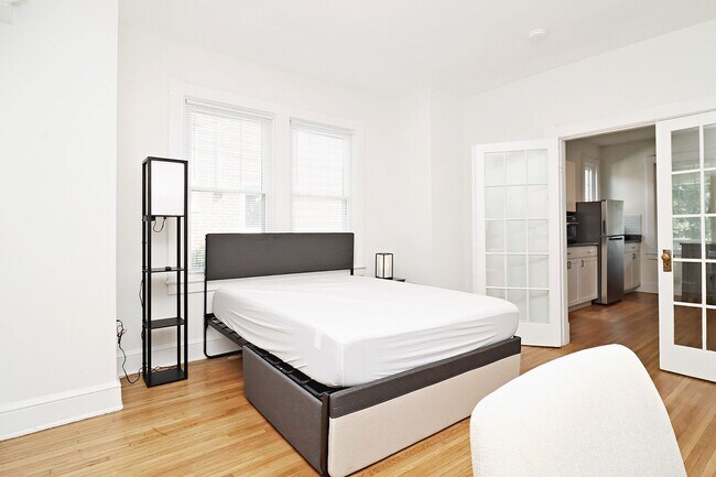 Building Photo - Furnished, Light-Filled Apartment With Utilities Included