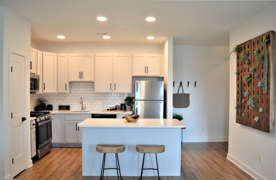 Open Kitchen with Island - The Reserve on East