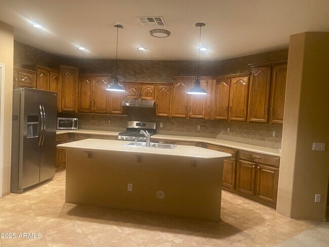 Building Photo - 3376 N 130th Ave