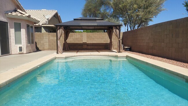 Building Photo - TERRIFIC FOUR BEDROOM PEORIA HOME WITH A POOL!