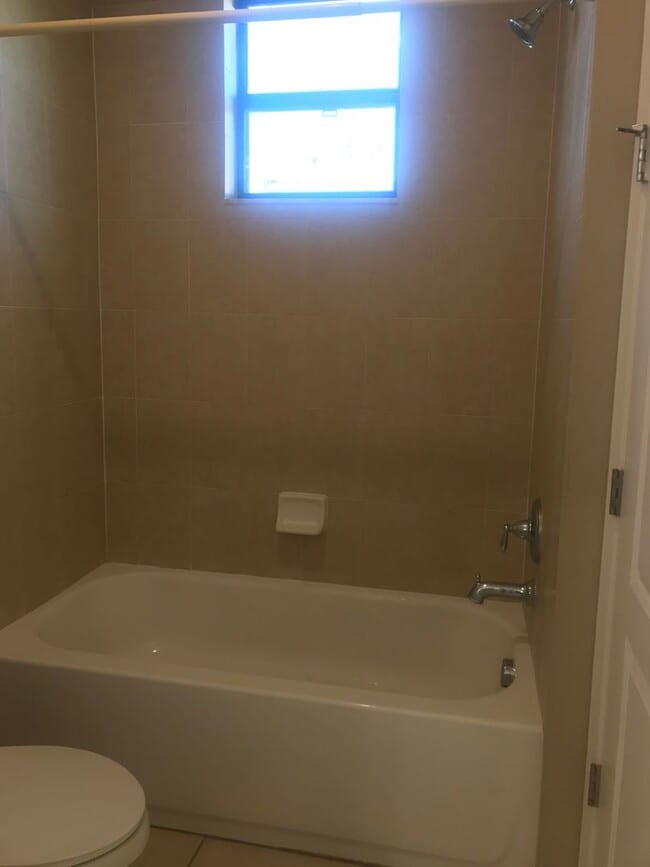 Building Photo - Lake Nona Townhome 3 Bed 2.5 Bath - Move in Special $500 off First Month Rent