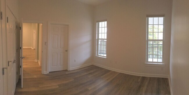 Building Photo - Inviting, modern two bedroom with garage parking, balcony views and a wonderful location in Chape...