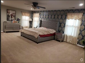 Building Photo - Spacious 4-Bedroom, 3-Bath Home with Moder...