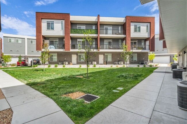 Building Photo - New 2024 Townhome with Office & 2 Car Garage