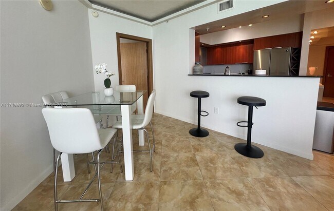 Building Photo - 16699 Collins Ave