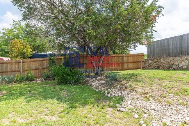 Building Photo - Well-Maintained Home with Large Yard and Storage Shed