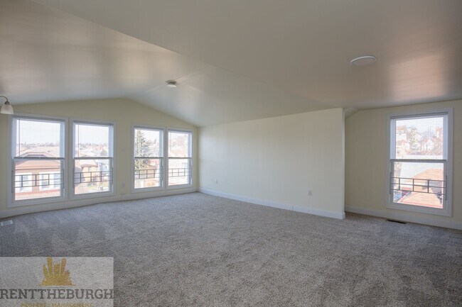 Building Photo - Updated 4BR House with 2 full baths and yard!