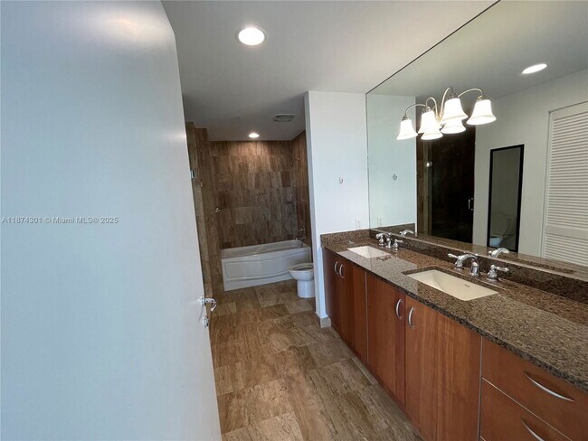 Building Photo - 300 S Biscayne Blvd