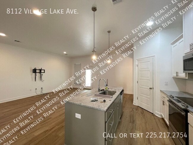 Building Photo - 8112 Village Lake Ave