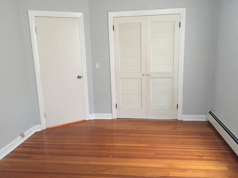 Hardwood floors and closet in bedroom - 142 Humboldt Ave