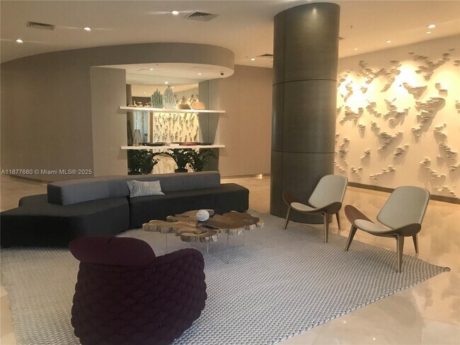 Building Photo - 10275 Collins Ave