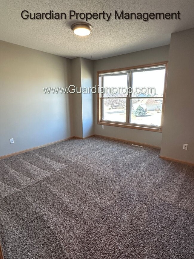 Building Photo - Brooklyn Park Single Family Home, Office, 3 Car Garage, New Carpet, Large Deck, Available Now