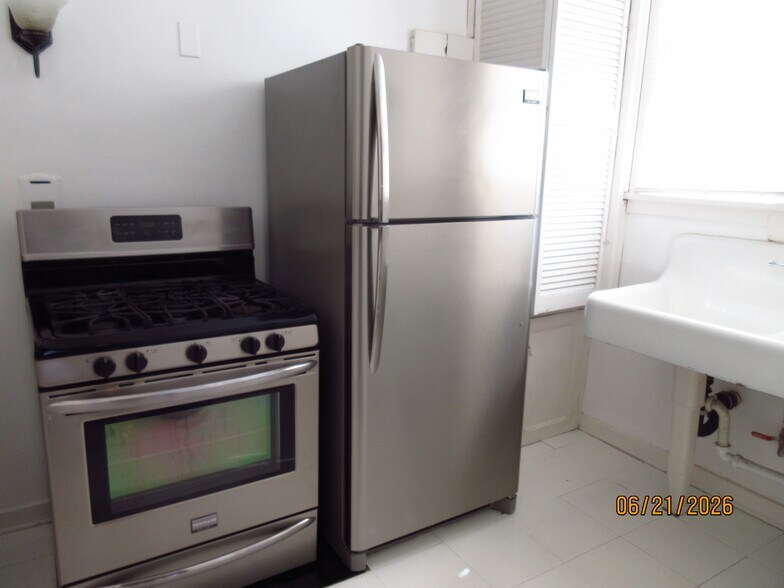STOVE AND FRIDGE - 4911 Dockweiler St