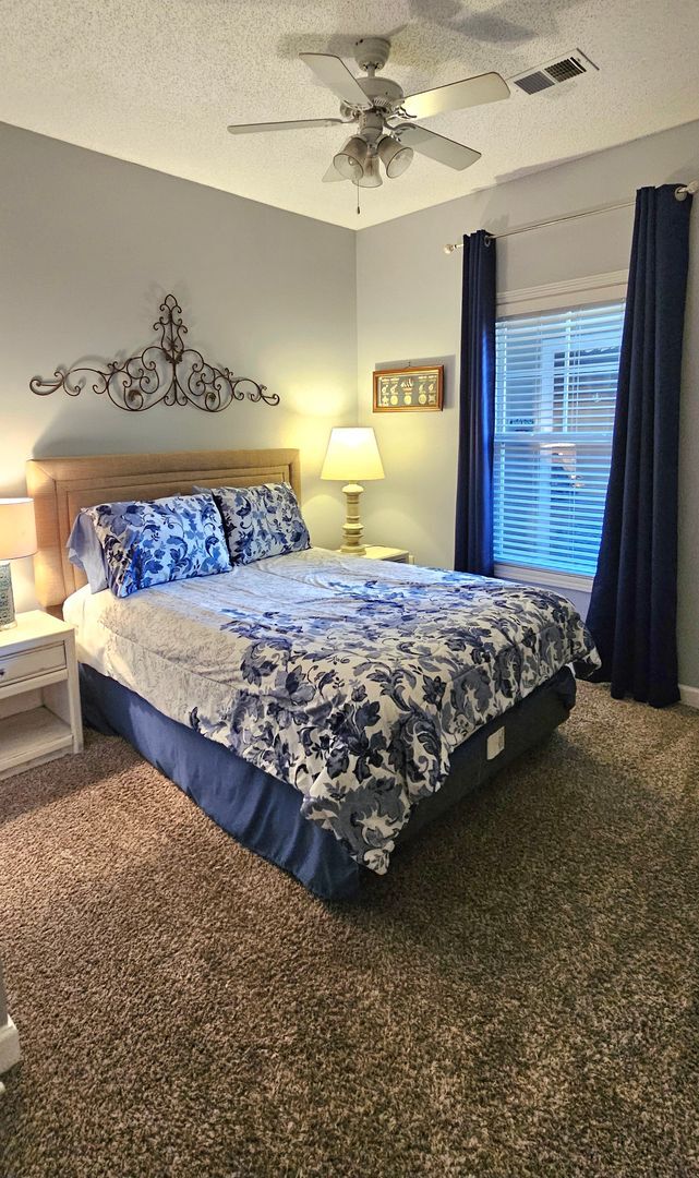 Building Photo - Stunning First-Floor, Fully Furnished Condo with Pond Views