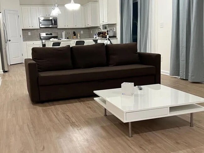 Building Photo - 2022 Four Bedroom Home Furnished