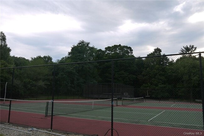 Building Photo - 5307 Villa at the Woods