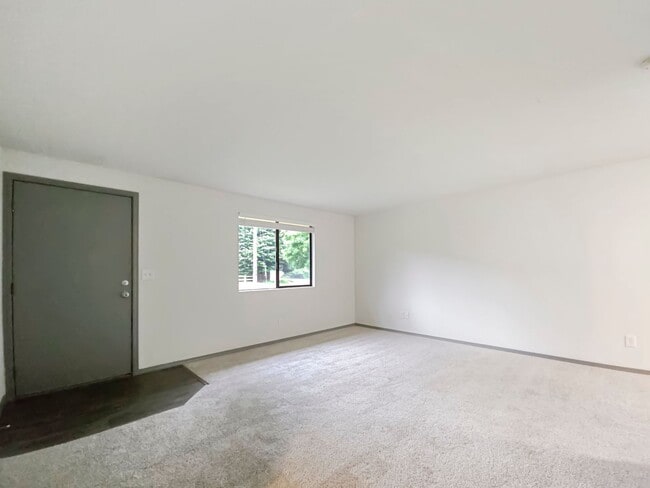 Building Photo - Pet-Friendly 2BR Duplex with Fenced Yard & New Carpets