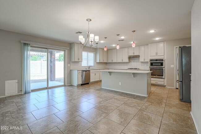 Building Photo - 12108 W Range Mule Dr