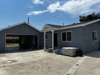 Building Photo - Remodeled 3 Bedroom 2 Bath House with 4 Ca...