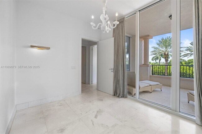 Building Photo - 7133 Fisher Island Dr