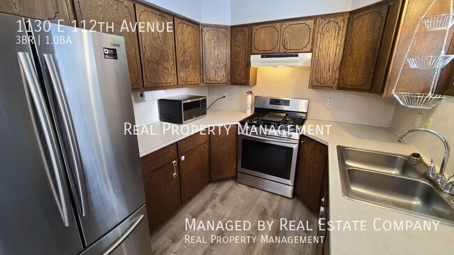 Building Photo - 1130 E 112th Ave