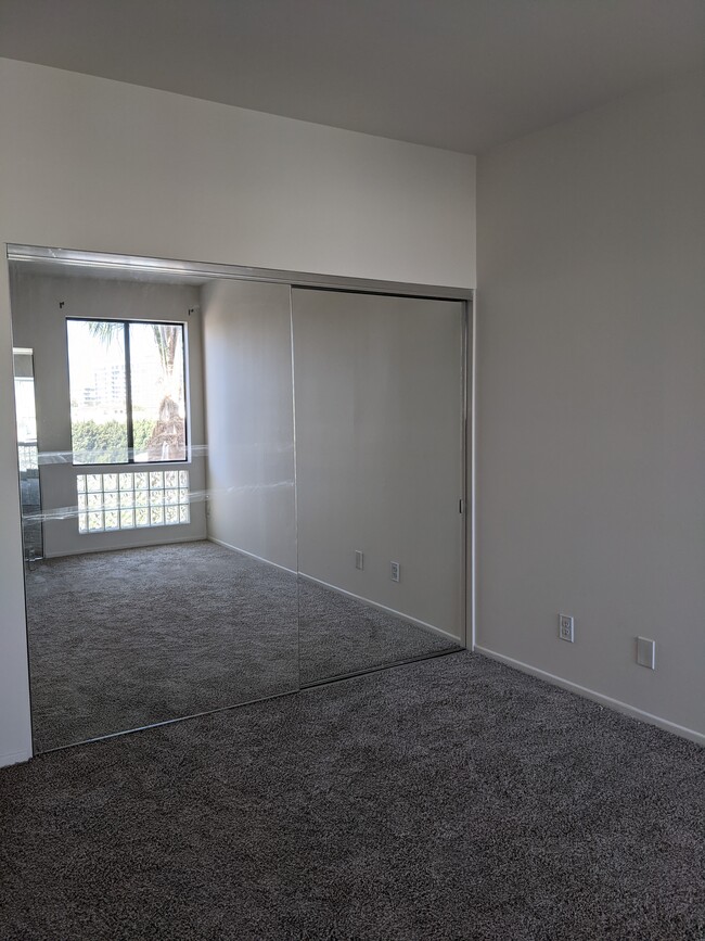 Spacious bright second bedroom. - 2491 Purdue Ave