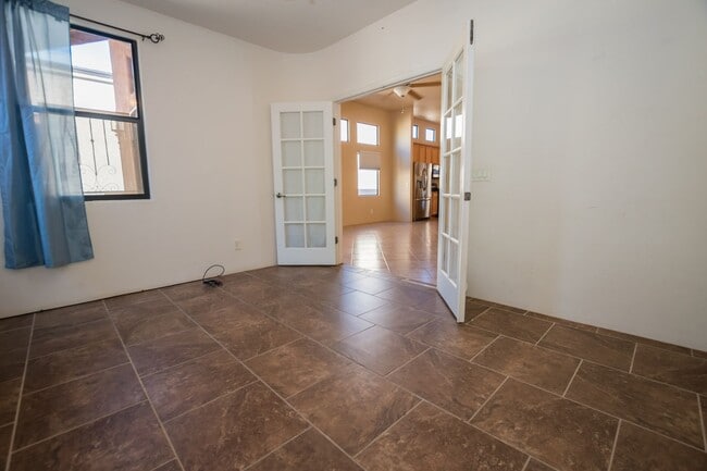 Building Photo - Gorgeous 3 Bedroom 2 Bathroom Home with Tile Throughout! Central A/C, 2 Car Garage!