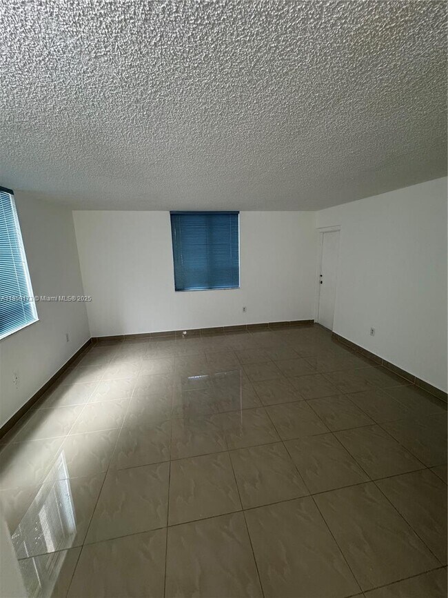 Building Photo - 6841 SW 147th Ave