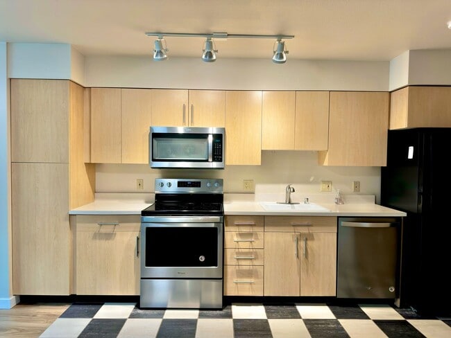 Building Photo - Downtown Bellevue Studio with Balcony, In-Unit Laundry & Amenities