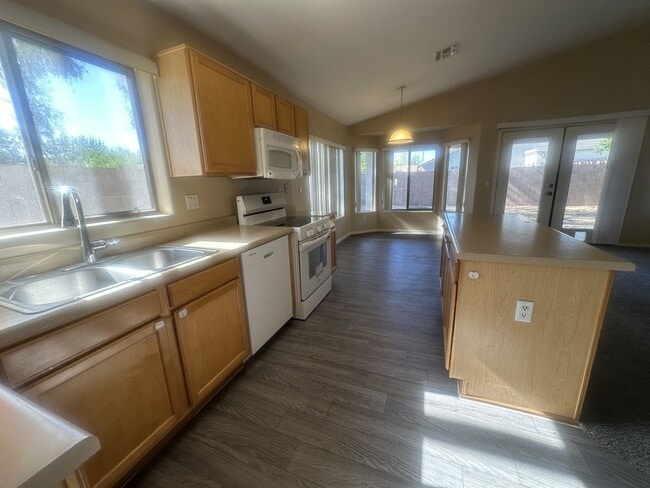 Building Photo - Rare single-level home offers 5 bedrooms and a versatile floor plan designed for comfortable living