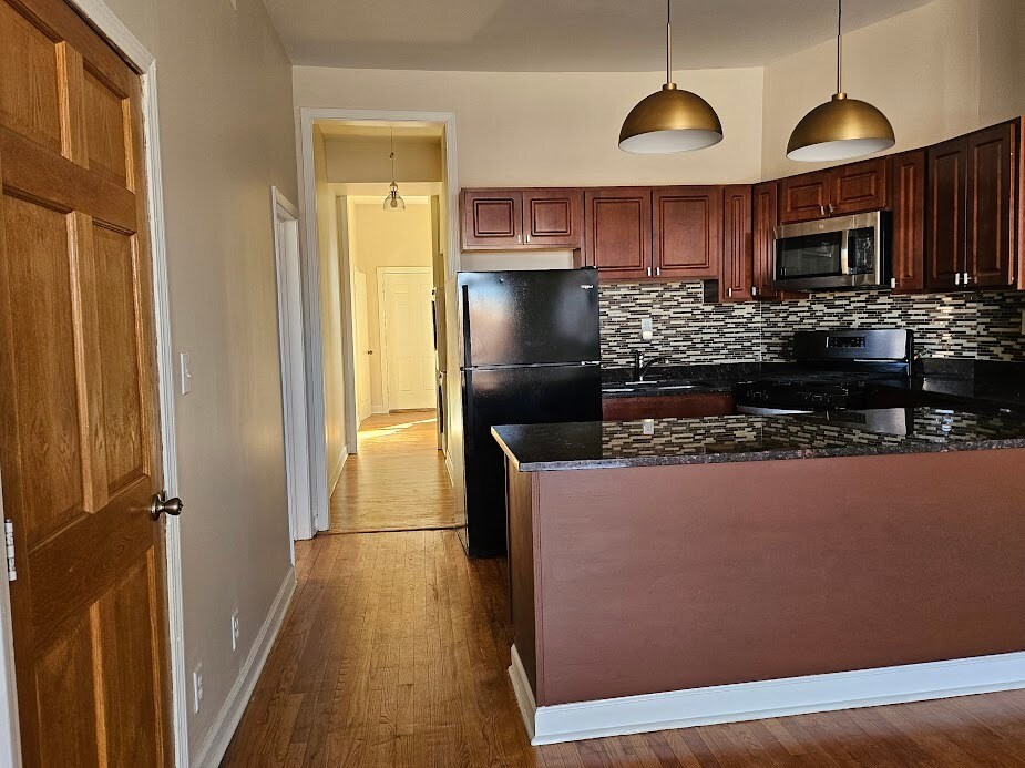 View south - 2417 W Warren Blvd