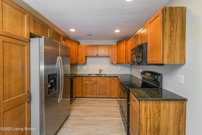 Building Photo - 7710 Dominique Dr