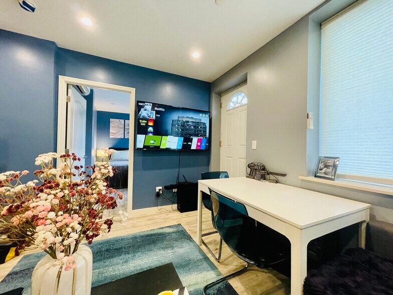 65”TV with Free WiFi - 838 41st St