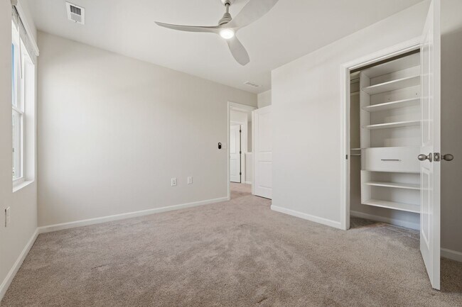 Building Photo - Move-In Ready 4BR Home | Deck, Patio & Open Concept Living