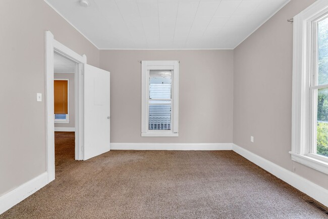 Building Photo - Charming Home with Updates and Covered Por...