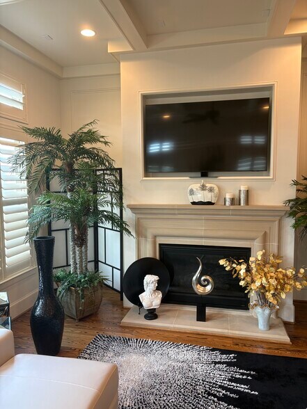 Shared fire place and smart tv in living room on second floor - 15927 Morgan St