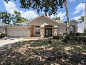 Building Photo - Spacious and well-appointed 4-bedroom, 3.5...