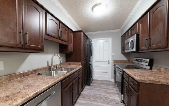 Full kitchen with laundry and dryer - 1728 Forrest Dr