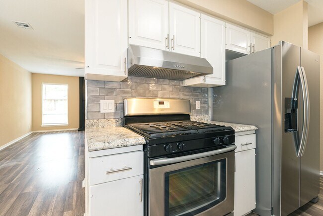 Building Photo - East 33rd Ct Duplex