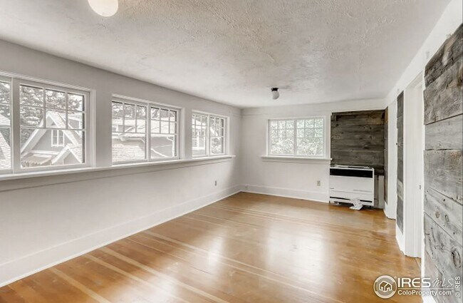 Building Photo - Charming Historic Carriage Home Steps from Pearl Street - Boulder Living at Its Finest!