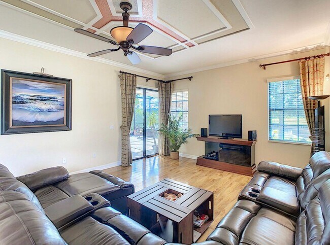 Building Photo - Luxury Living in Woodland Lakes Preserve: Fully-Furnished