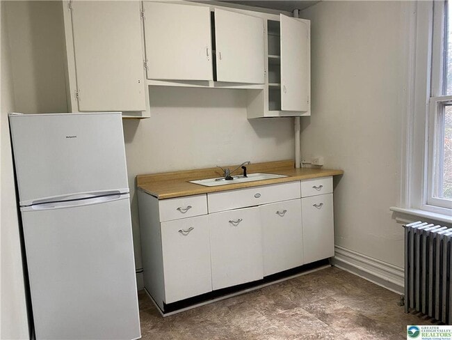 Building Photo - 112 13th Ave