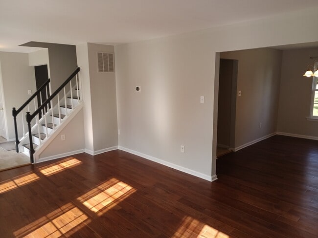 Building Photo - This charming 1,732-square-foot single-family home offers 3 bedrooms and 3 bathrooms, featuring a...