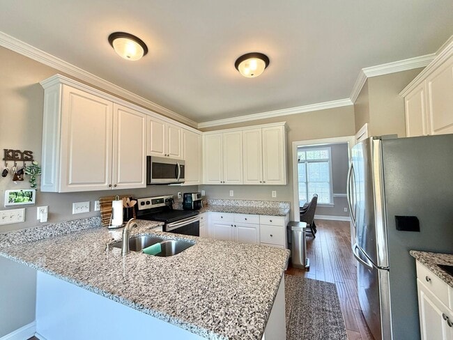 Building Photo - Spacious 3BD, 2.5BA Raleigh Home with First Floor Primary Bedroom & Fenced Yard