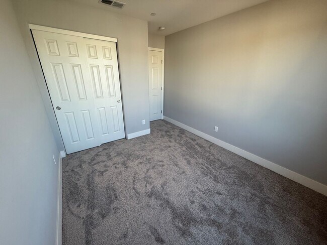Building Photo - NEW PHOTOS! Two-level home located in Coff...