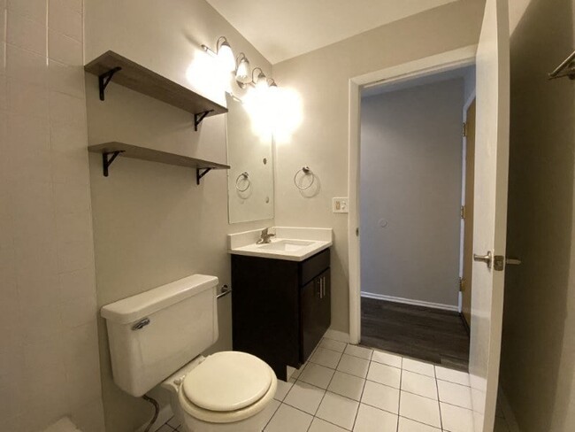 Bathroom with storage shelves - 1732 North Dayton