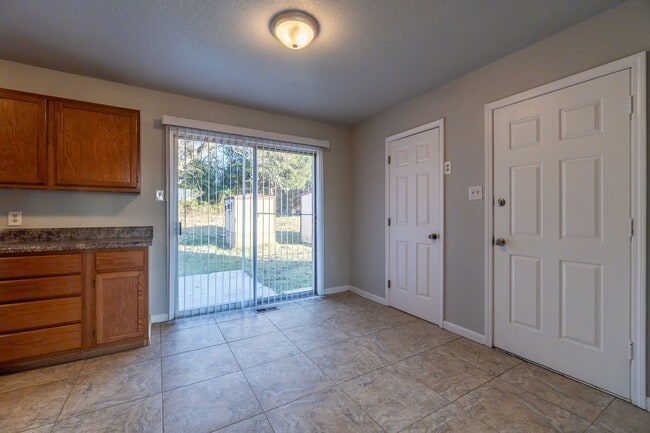 Building Photo - * Move-In Special * Charming 3 Bed / 1.5 Bath Home in Greenwood (1 Acre Lot)